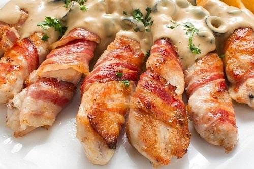 Рулетики из свинины с начинкой в духовке